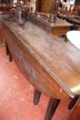 A Georgian style mahogany wake table 74cm high, 136cm extended  Best Bid