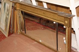 A Regency style giltwood overmantle mirror 64cm high, 142cm wide