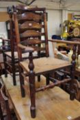 A set of eight 19th century elm ladder-back chairs