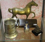 *A small Danish ceramic model of young boy drinking on top of a barrel; 10cm high, a brass model of