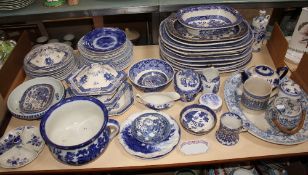 A large quantity of 19th Century and later blue and white ceramics including twelve meat plates and