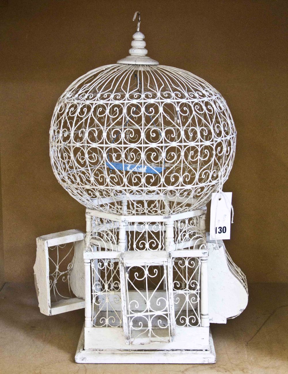 A decorative birdcage; approximately 50cm high Best Bid