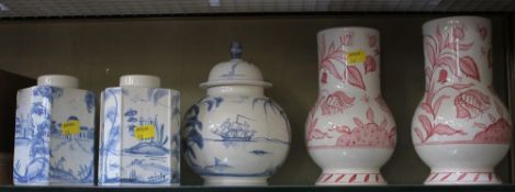 A pair of modern pink and white 18th century style vases together with two similar blue and white