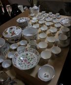 A Coalport `Revelry` coffee service, a Royal Worcester Evesham pattern part dinner set, a