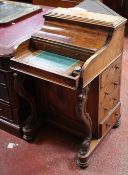 A Victorian walnut piano top davenport (damaged) with a fitted interior 93cm high, 57cm wide