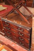 A George III mahogany chest with a brushing slide and four long drawers 73cm high, 95cm wide