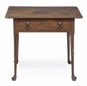 A George II oak side table, circa 1740 with a frieze drawer on turned legs and pad feet 68cm high,