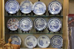 A group of twelve mixed Chinese export plates, all approximately 23cm in diameter