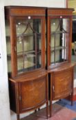 A pair of Edwardian mahogany and marquetry display cabinets each 185cm high, 65cm wide