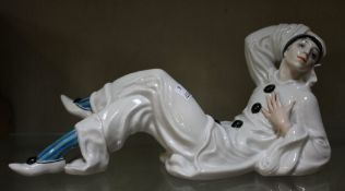 A Rosenthal model of a reclining clown, `K.549` to base; 30cm long