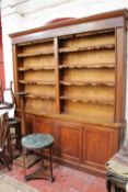 A large Regency style mahogany bookcase with adjustable shelves, 252cm high, 232cm wide