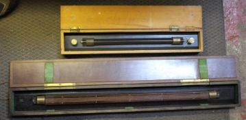 A cased Stanley Navigation parallel rule and another larger stamped HN&B also cased.