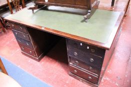 An early 20th Century mahogany pedestal desk with eight drawers 159cm wide  Best Bid