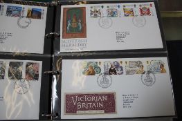 Three stamp albums and an album of first day covers (4)  Best Bid