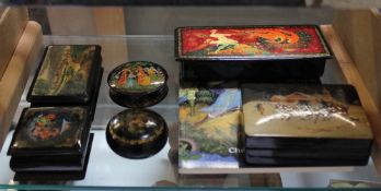 A 20th Century Russian lacquer box, Firebird, together with five others and a related collectors