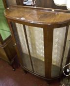A cabinet on chest in 18th Century style & two early 20th Century walnut display cabinet.