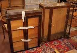 A 1950`s walnut display cabinet, glazed bookcase and set of open shelves  Best Bid