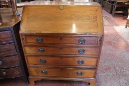 A George III mahogany and inlaid bureau with four long drawers 107cm high, 90cm wide  Best Bid