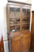 A late Victorian mahogany and glazed bookcase cabinet 209cm high, 93cm wide