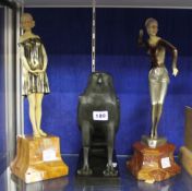 A pair of modern Art Nouveau style female figures and a resin figure of a raven (3)