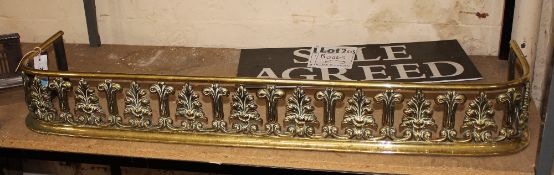 A William IV brass fender 110cm length