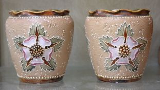 A pair of Doulton Lambeth Slaters vases; 12cm high