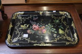 Two Victorian style tin trays with printed decoration, a Victorian footstool, a pine framed mirror