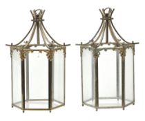 A pair of gilt metal and glazed hexagonal section hall lanterns, second quarter 20th century, each