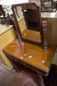A Victorian mahogany dressing table with fitted mirror 135cm high, 90cm wide