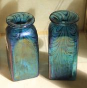 A pair of small iridescent glass vases; 14.5cm high (2) Best Bid