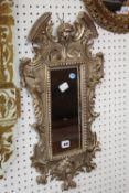 A Chippendale style gilt mirror 66cm high, 35cm wide