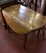 A provincial drop leaf table with a frieze drawer on square tapering legs 110cm wide