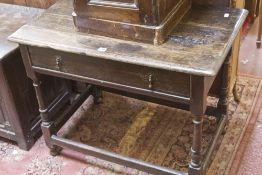 An oak side table, late 17th century/early 18th century with a frieze drawer 91cm wide