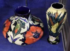 A Moorcroft vase decorated with poppies, initialled JH and dated `96 to base; 18cm high, another