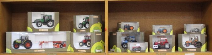 Seven Universal Hobbies 1:32 scale boxed Country Collection Tractors and four 1:43 examples.