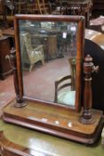A Victorian mahogany dressing table mirror and an upholstered foot stool