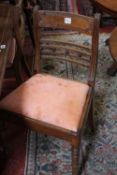 A set of five Regency mahogany dining chairs