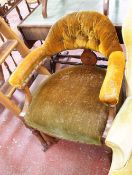 An early Victorian oak desk chair, with horseshoe back and tapered turned legs