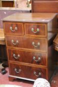 A mahogany and satinwood crossbanded chest of drawers, circa 1900 106cm high, 71cm wide