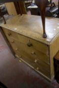 A Victorian scumbled pine chest with two short and three long drawers bearing stamp to drawer J.A