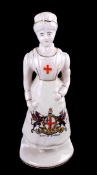 Rare Model of a Nurse Clutching a Medicine Bottle By Carlton China (City of London) restored, 145mm