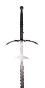A German Two-Hand Sword with a broad 132cm wavy-blade, the forte with flattened edges for additional