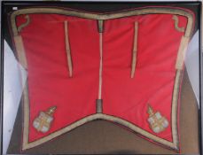 A Red `Shabraque` or Ceremonial Saddlecloth Bearing the Crests of the City of London with Scrolled