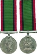 SOUTHERN RHODESIA MEDAL FOR WAR SERVICE, 1939-1945, unnamed as issued. Toned, about extremely