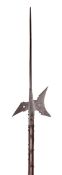 A German Halberd, 16th Century with long central spike of diamond section, curved axe-blade