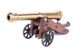 A Fine Large Model Cannon, 19th Century with a 40cm four-stage brass barrel moulded at the muzzle,