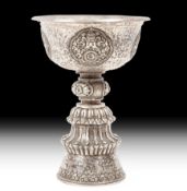A Tibetan silver butter lamp, 18th-19th century , of fine repousse’  A Tibetan silver butter lamp,