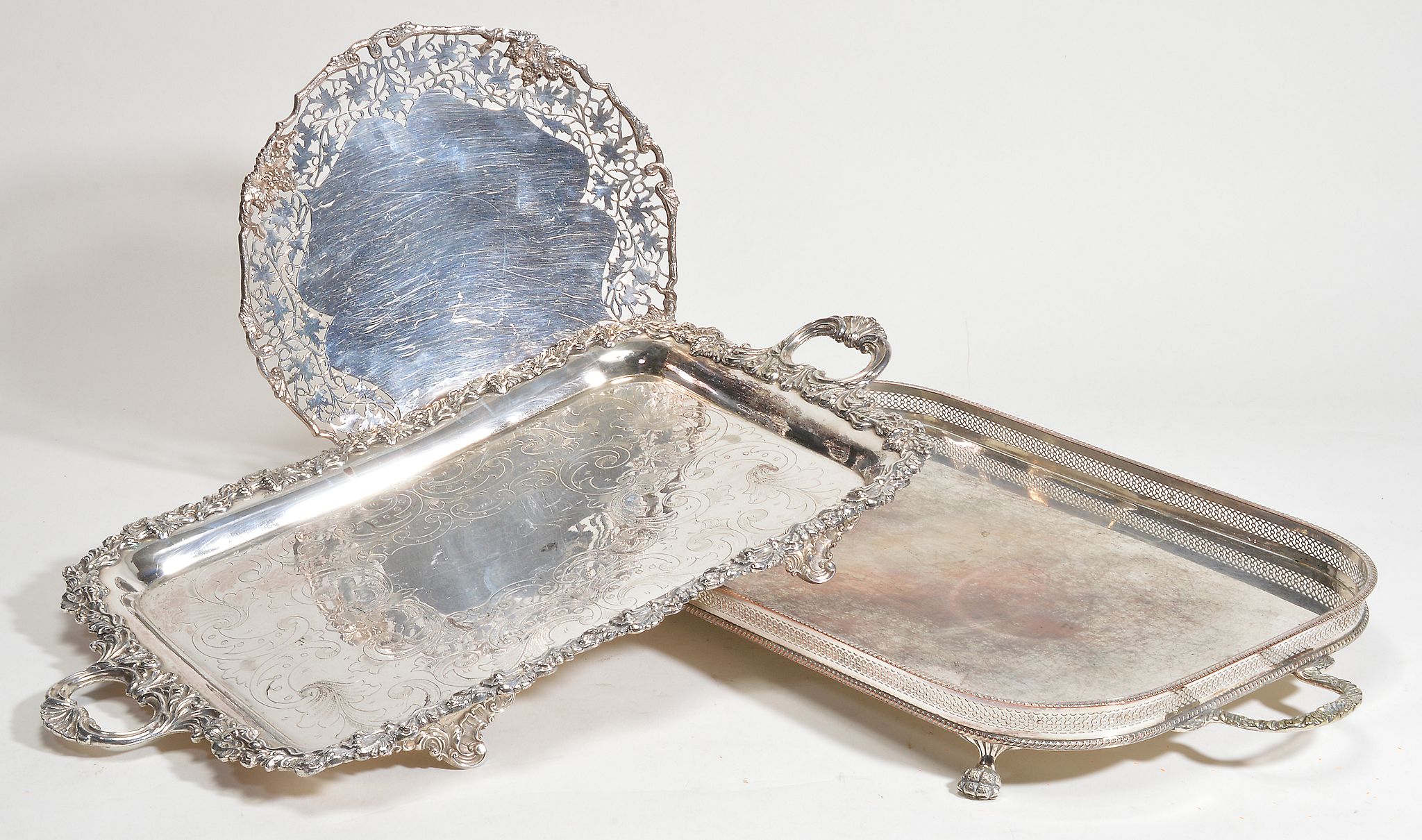 An electro-plated rectangular twin handled tray , with a cast border, 57 An electro-plated