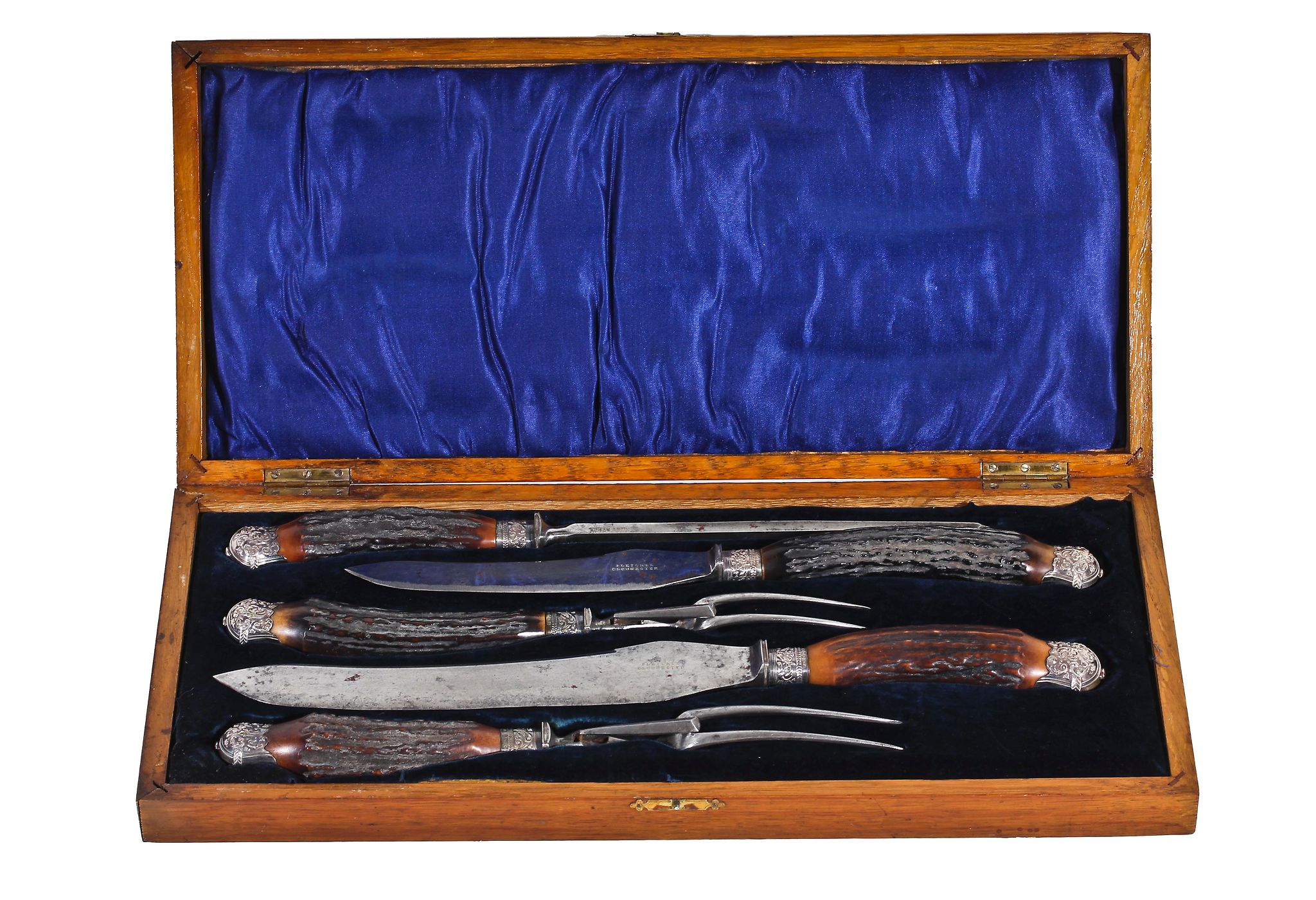 A late Victorian five piece carving set with stag horn and silver handles A late Victorian five