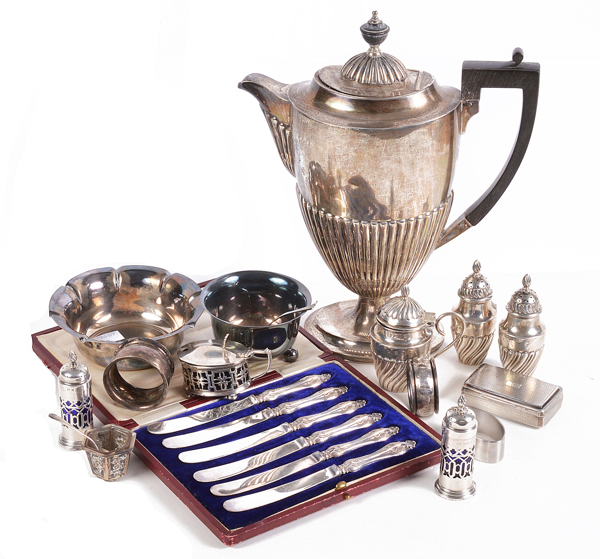 A collection of silver, to include: a silver coffee pot by John Round & Son Ltd A collection of